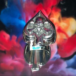 A skull and cross bones in spade
BNWT